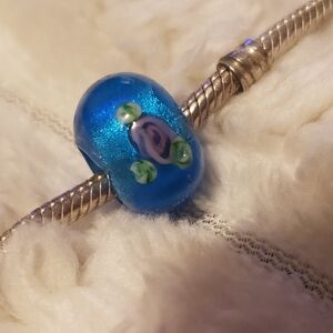 2/ $13 Blue Glass Bead Charm with Purple Floral Design